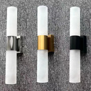 Three modern led wall lamps with frosted glass cylinders and silver gold and black metallic bands for bedroom decorbites wall lamp