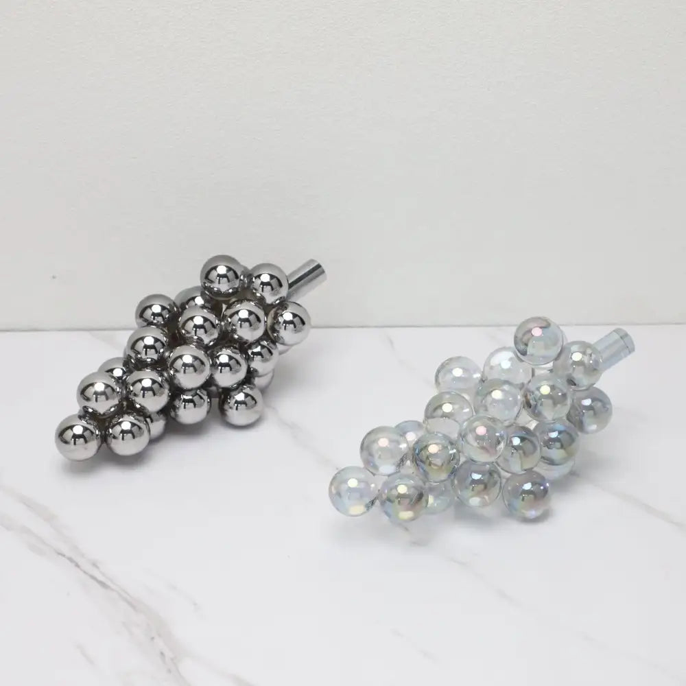 Modern silver gold and chrome crystal grape decorative sculpture featuring polished silver and iridescent translucent clusters