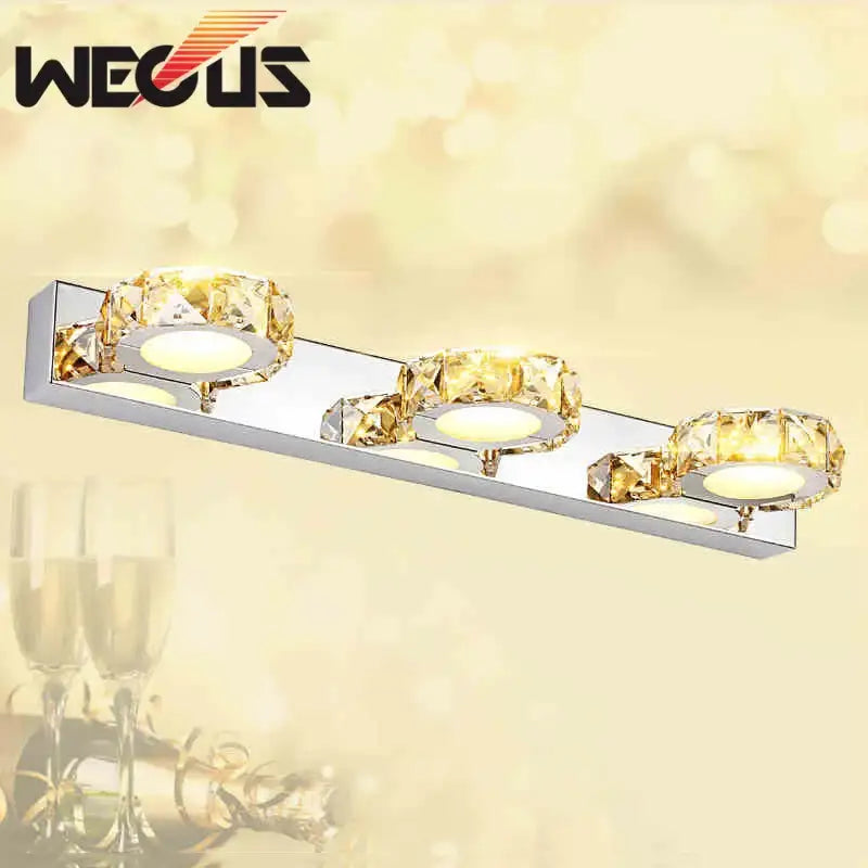 Modern silver and gold decorbites crystal bedroom wall lamps with three illuminated circular fixtures for mirror lighting