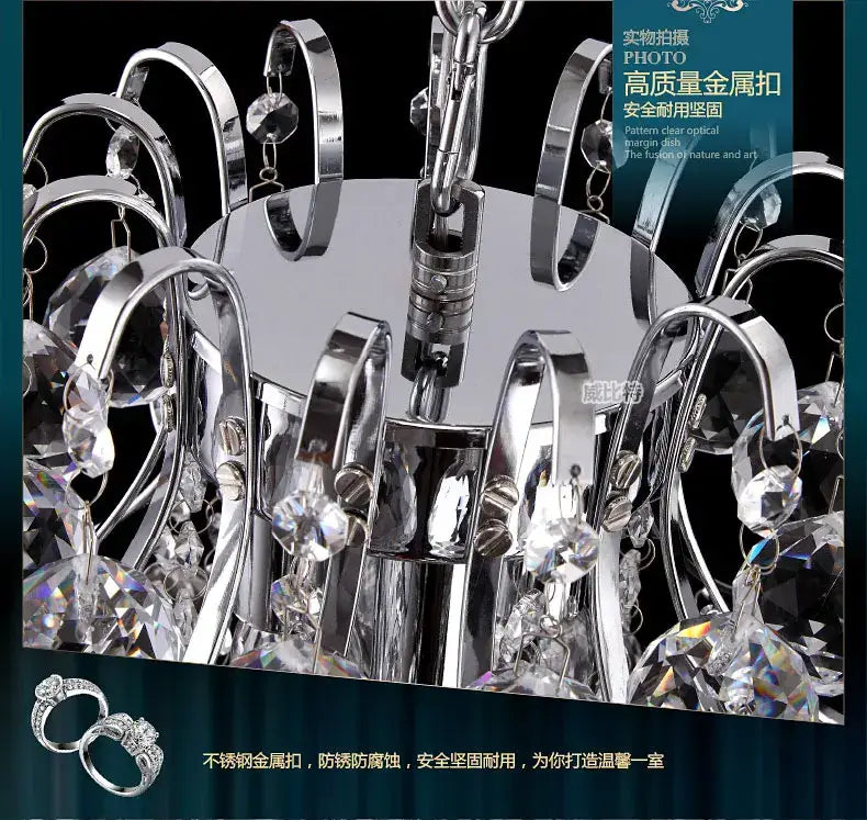 Modern silver and gold decorbites crystal chandelier with chrome finish metal arms and clear crystal droplets for living room