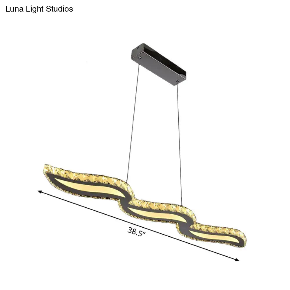 DecorBites™ minimalist LED ceiling light with gold and black wavy design featuring silver island pendant for restaurants