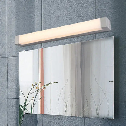 Modern silver led bathroom vanity light with acrylic shade and maximum bulb wattage 110v-120v mounted above mirrored cabinet