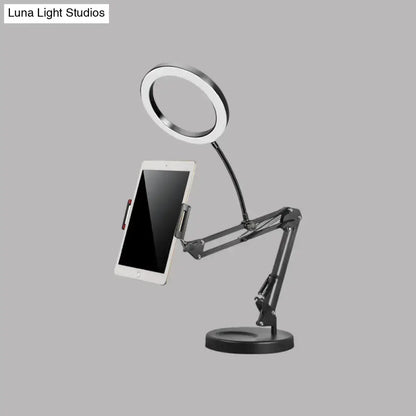 Black adjustable led light desk lamp with mobile phone holder and tablet stand for modern bedroom use