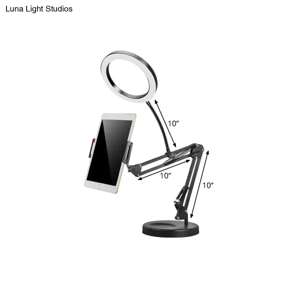 Modern silver led light desk lamp with adjustable black arm and mobile phone holder for bedroom use