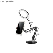 Modern silver led light desk lamp with adjustable black arm and mobile phone holder for bedroom use