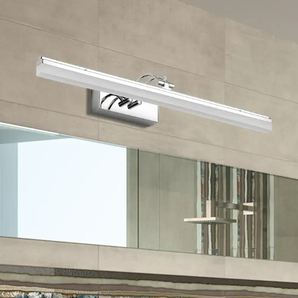 Modern silver linear led wall light with acrylic shade in warm white finish mounted above bathroom mirror