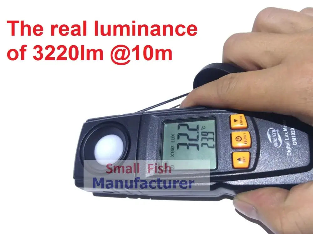 Black digital lux meter with orange buttons and white sensor measuring 3220 lx for modern silver metal 300w follow spot light