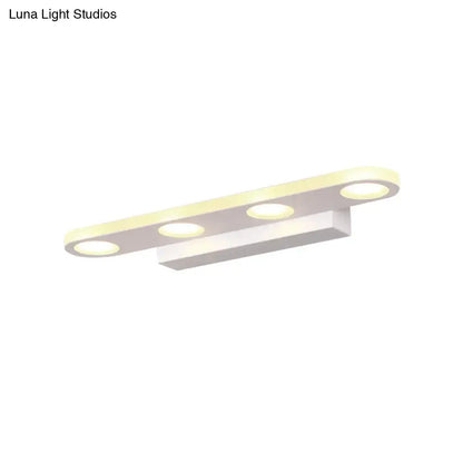 Modern silver oblong acrylic led wall light with three white circular bulbs for bathroom vanity mirror lighting