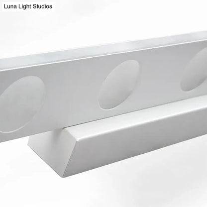 Modern silver oblong acrylic led wall light bathroom vanity mirror featuring a silver metallic channel rail with oval cutouts