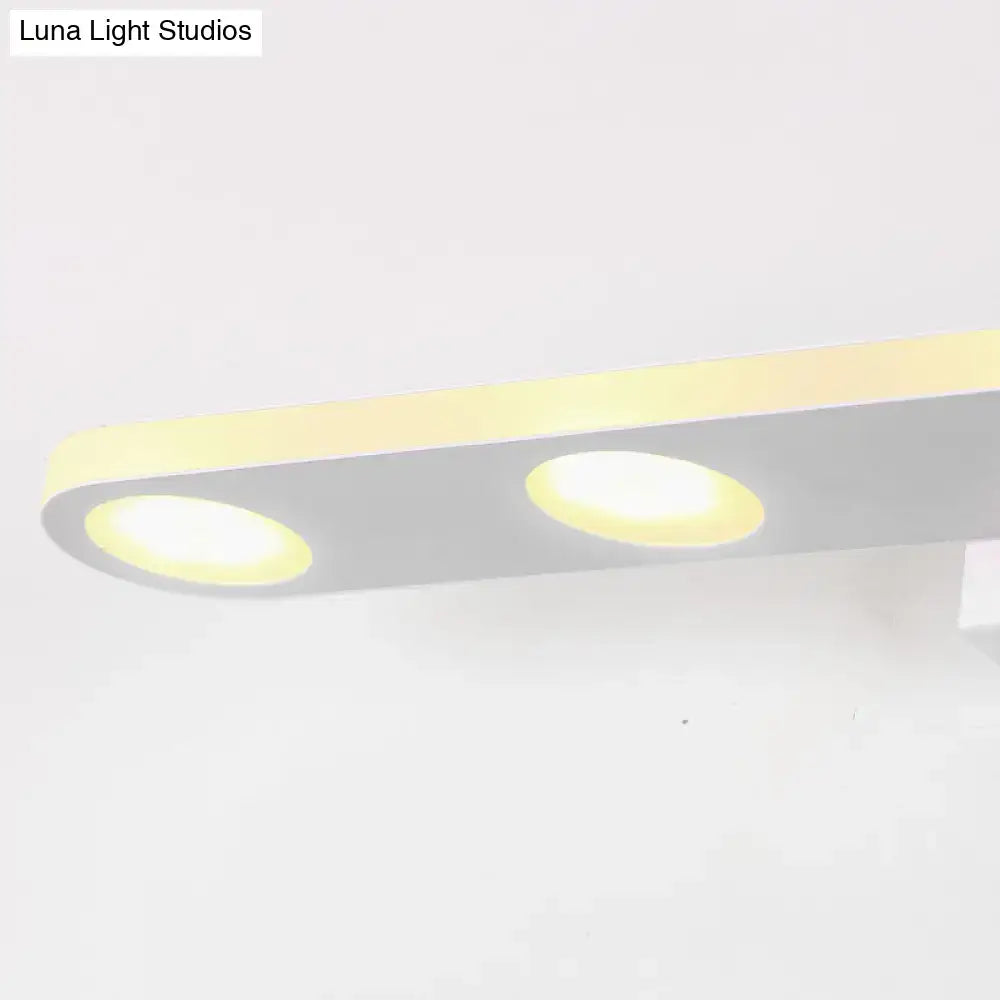 Modern silver oblong acrylic led wall light with two circular warm yellow led fixtures in sleek white and matte gray housing