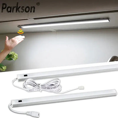 Modern silver rectangular led cabinet light with hand sweep switch and white power cord for kitchen use