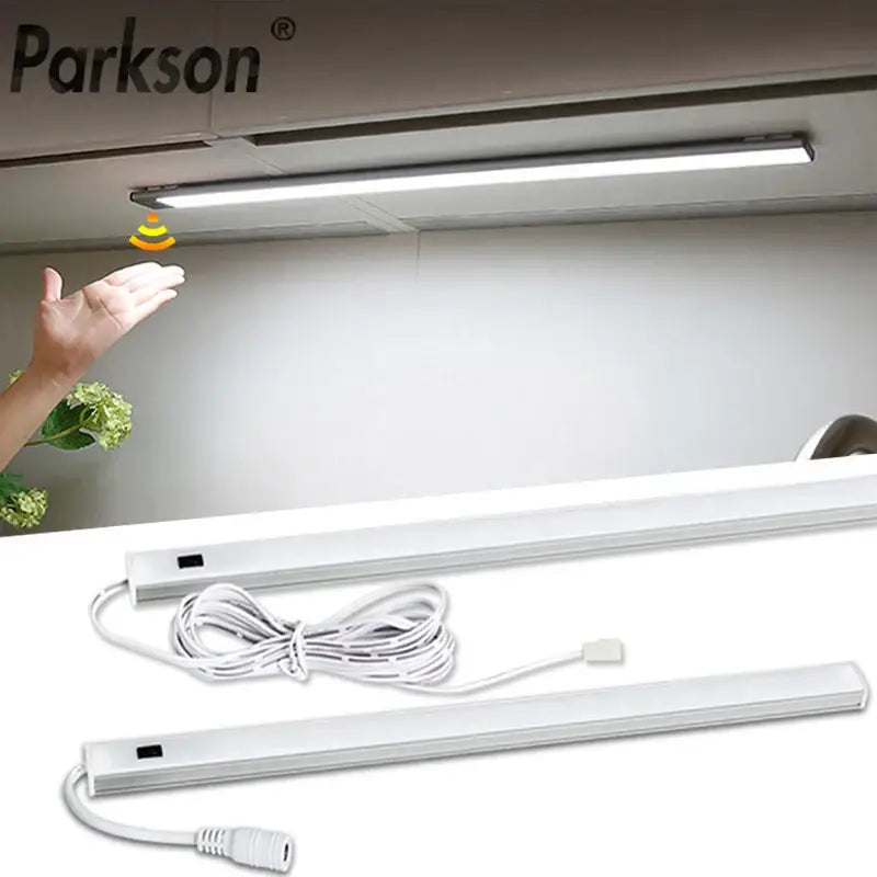 Modern silver rectangular led cabinet light with hand sweep switch and white power cord for kitchen use