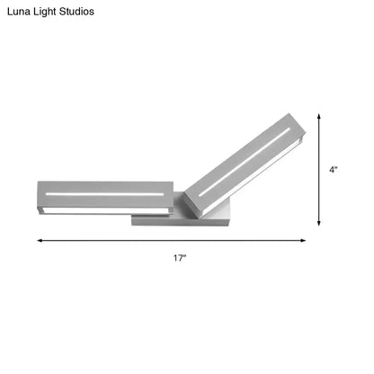 Modern silver rectangular led wall mounted light with two angled panels for bedroom sconce illumination