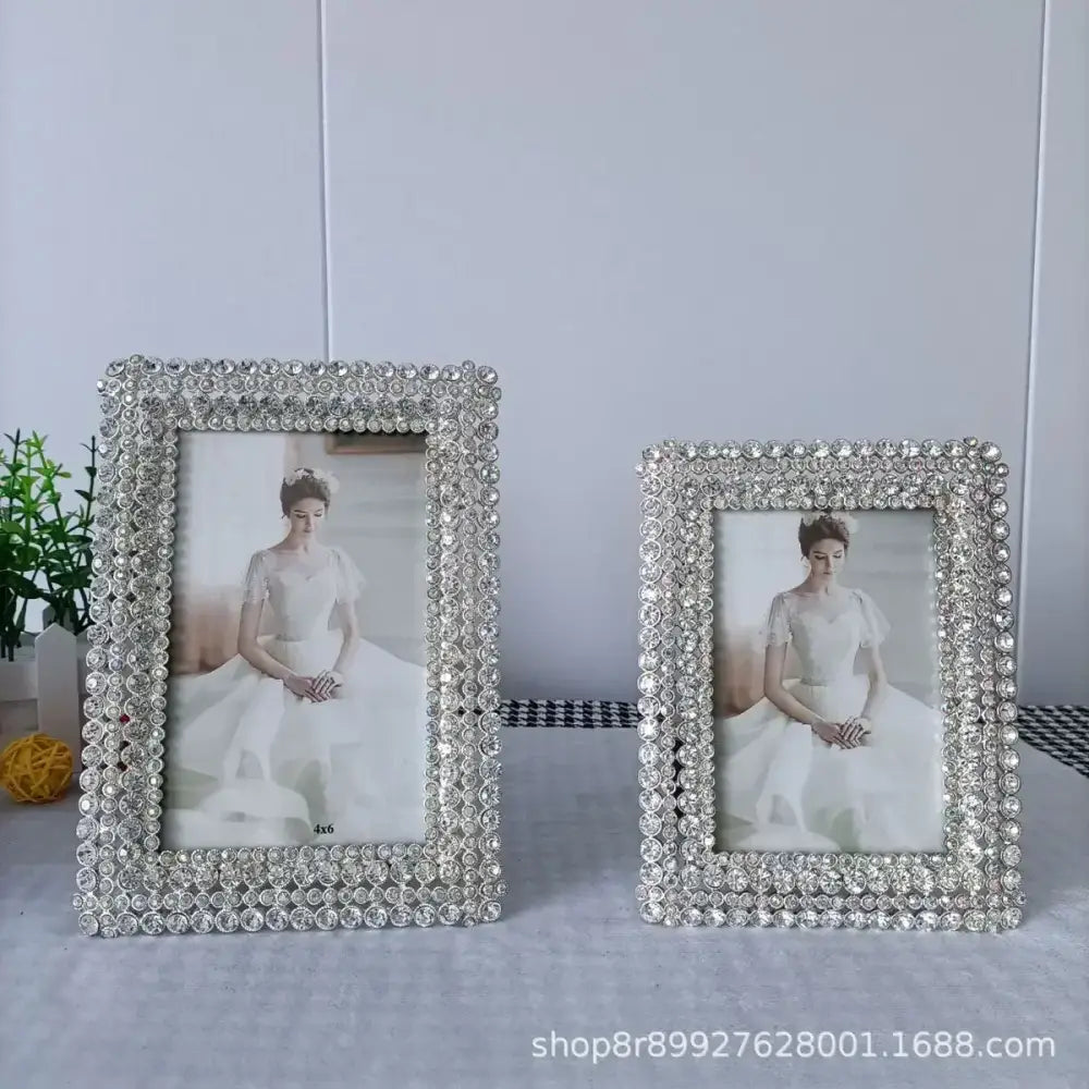 Two silver-toned metal picture frames with dense clear rhinestone borders for modern bedroom decor