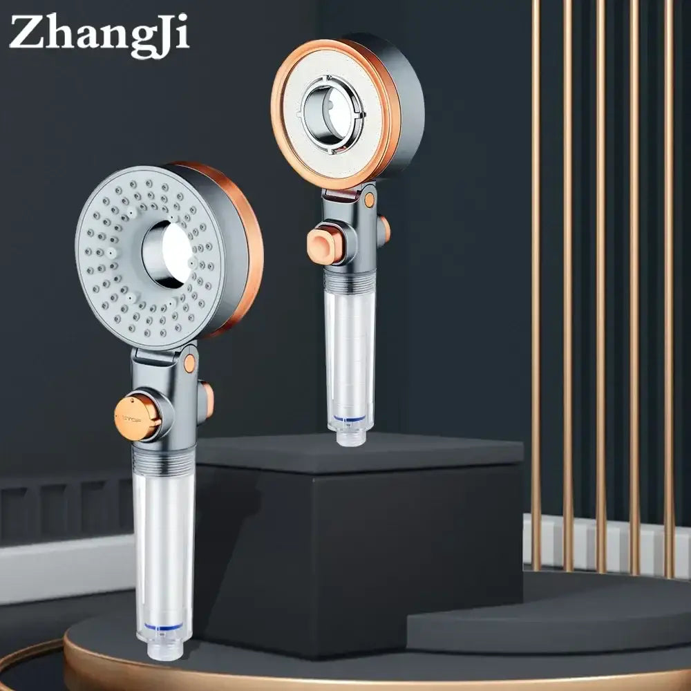 Modern silver and rose gold dual-sided shower head with adjustable spray settings and transparent filter housing by decorbites