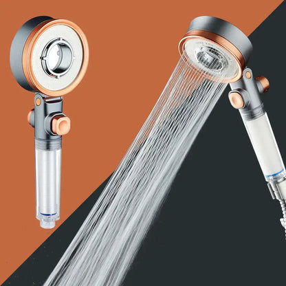 Modern silver and rose gold dual-sided shower head with sleek black and copper finish and transparent water filter cartridge