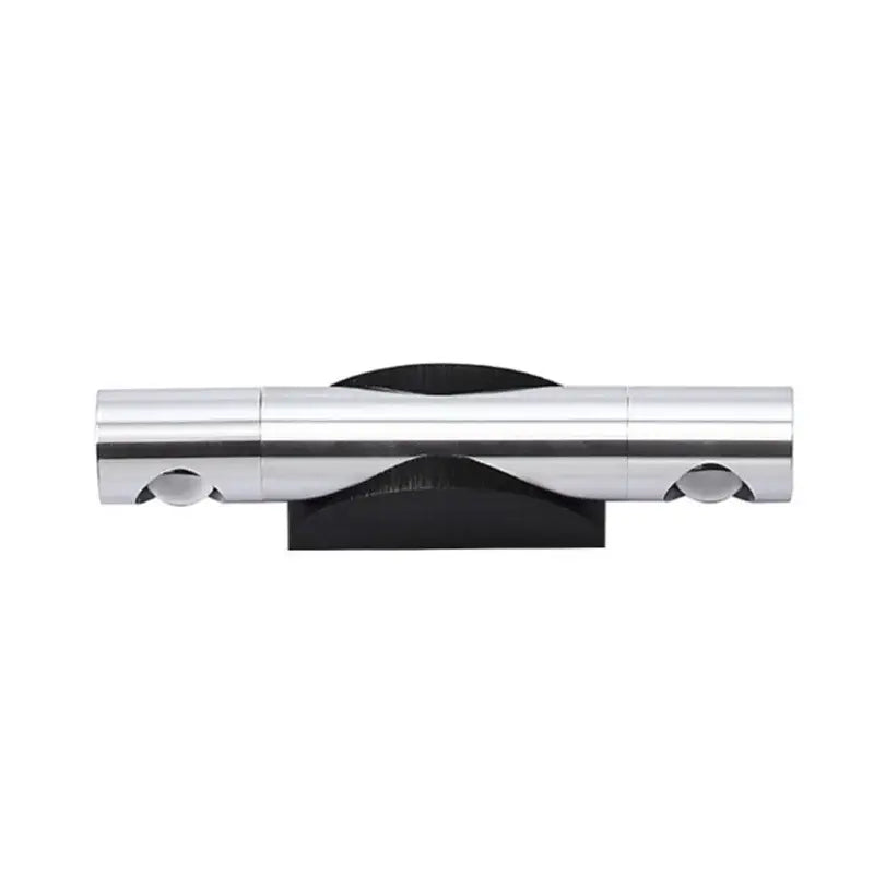 A sleek modern silver chrome rotatable wall lamp with dual adjustable spotlights and a minimalist black base by decorbites