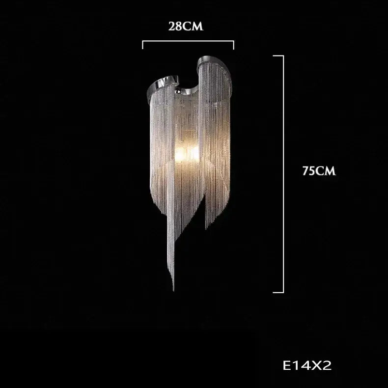 Modern silver tassel chain chandelier with cascading chains and wing-like design for dining room decorbites gold tassel