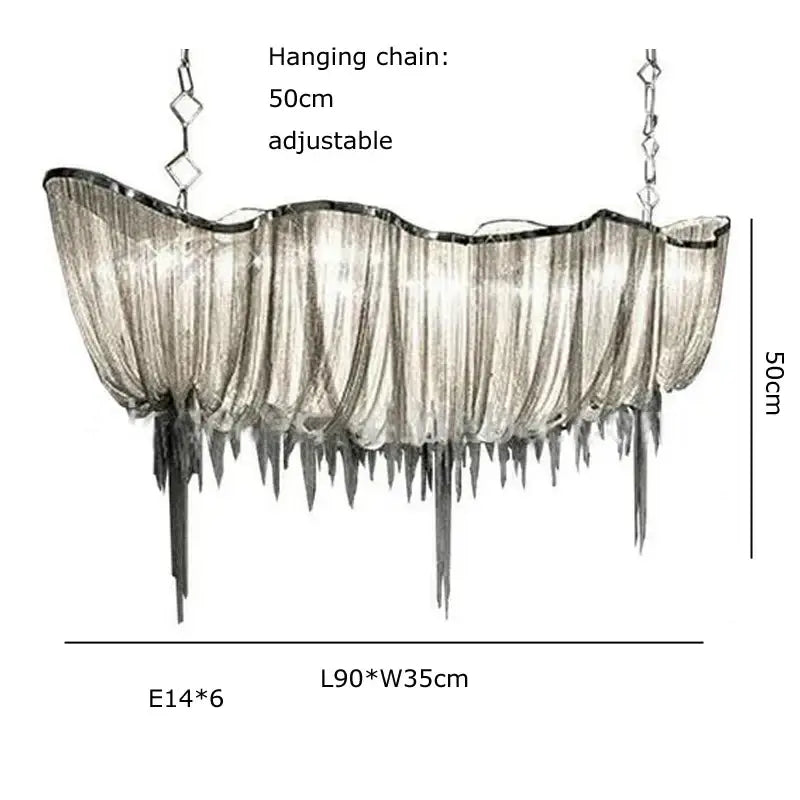 Modern silver tassel chain chandelier with flowing curtain design and icicle elements for dining room decorbites gold tassel