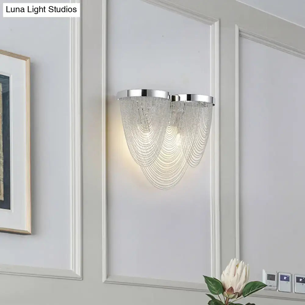 Modern silver tassel chain wall light with chrome finish and clear crystal beads for sitting room sconce lighting