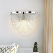 Modern silver tassel chain wall light with chrome frame and clear crystal beads for sitting room use