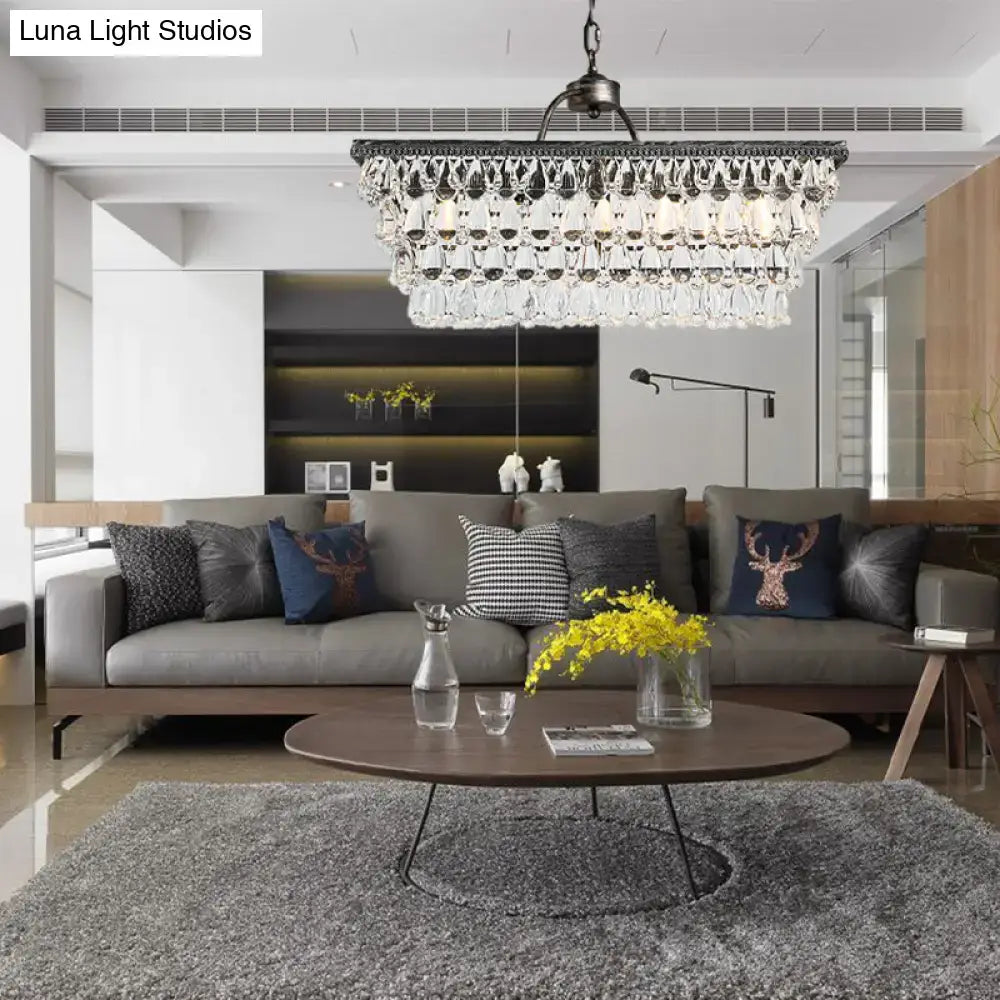 Modern silver teardrop crystal ceiling light with dark metal frame and clear droplets suitable for 220v-240v living room use