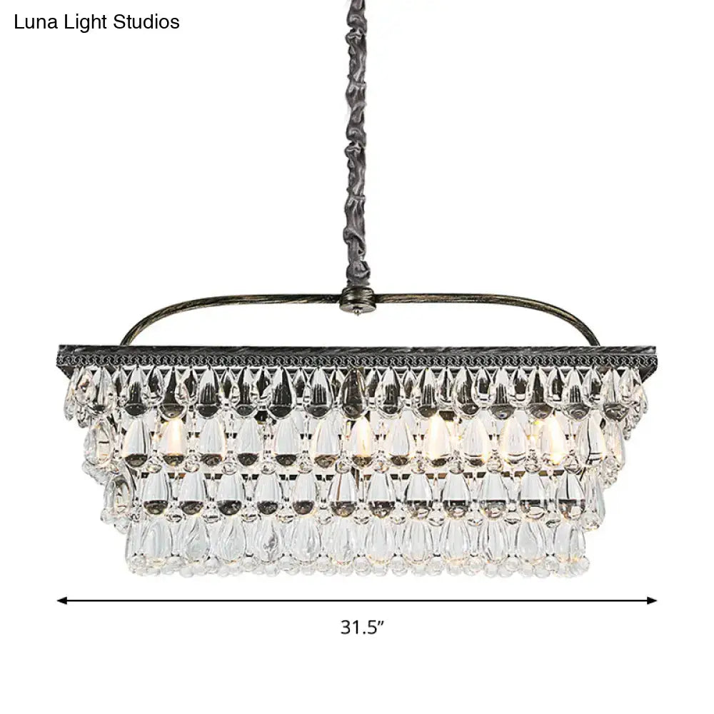 Antique bronze-finished ceiling light with teardrop crystal droplets hanging from a twisted metal chain 220v-240v
