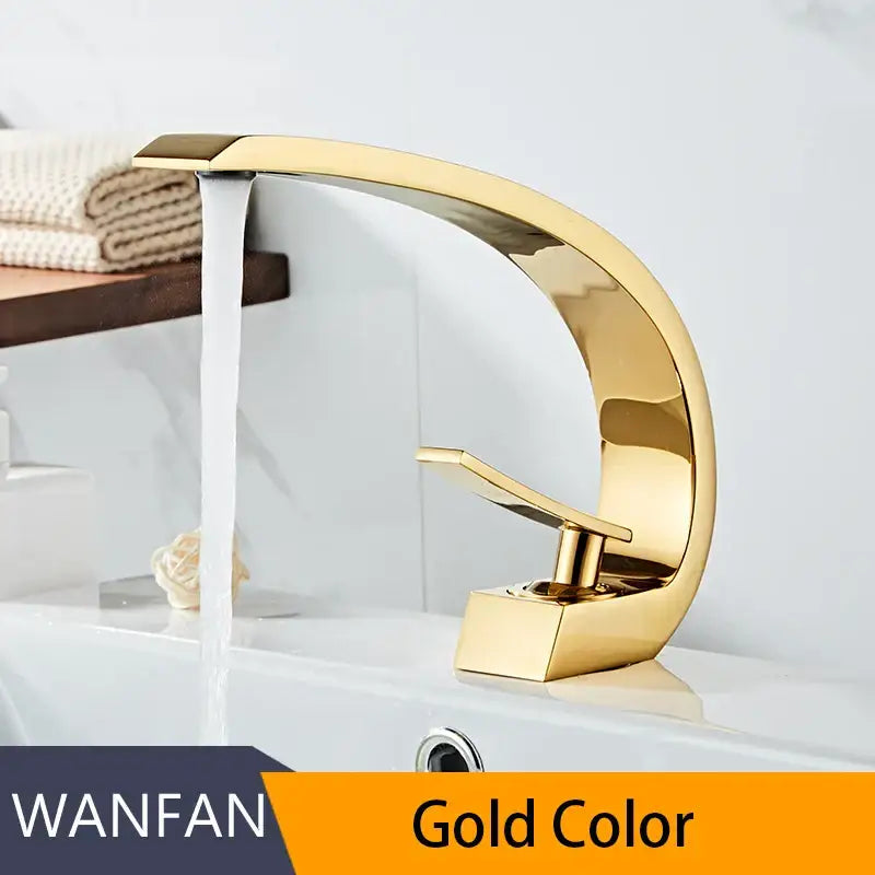 Modern silver waterfall basin faucet with gold-colored sleek curved design and polished metallic finish decorbites basin faucet