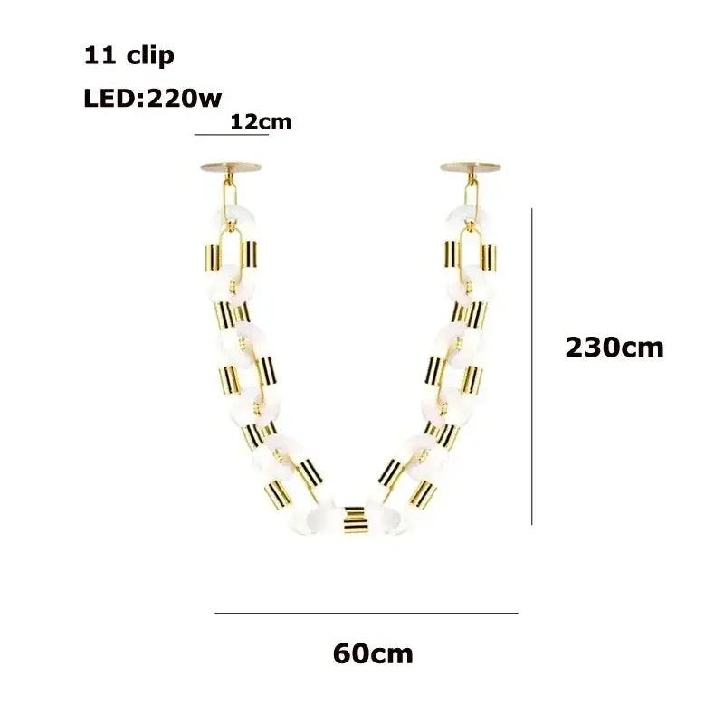 Modern silver and white crystal gold chain chandelier with translucent oval beads and gold chain chandelier accents