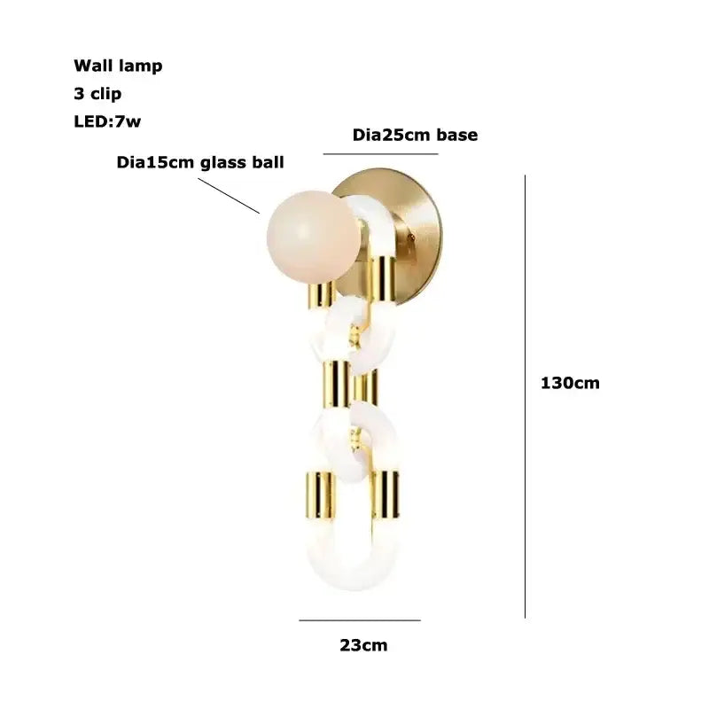 Modern silver and white crystal gold chain chandelier featuring a gold-toned wall lamp with frosted glass ball and gold chain links