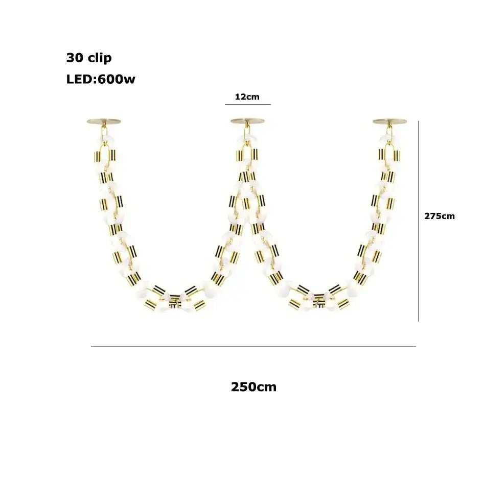 A modern gold chain chandelier with a sleek frame and white opaline beads for dining room decorbites crystal gold lighting