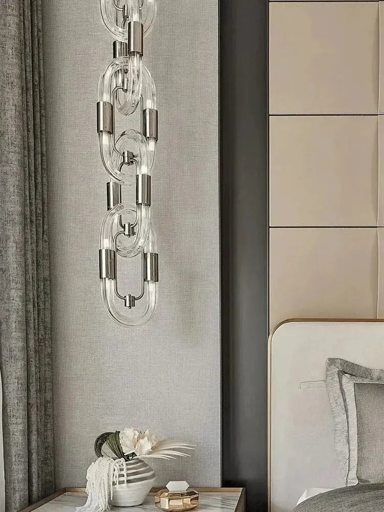 A modern silver and white crystal gold chain chandelier with transparent glass and polished metal accents for dining room decorbites crystal gold