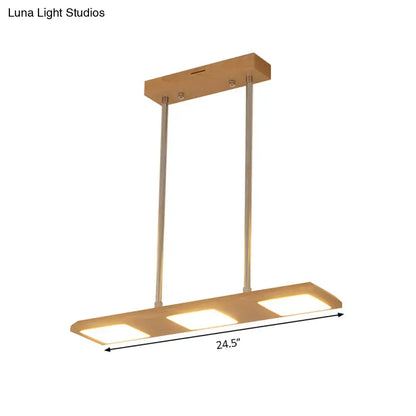 Modern simple rectangle wood island lamp with three warm led panels and sleek wooden top for dining room use
