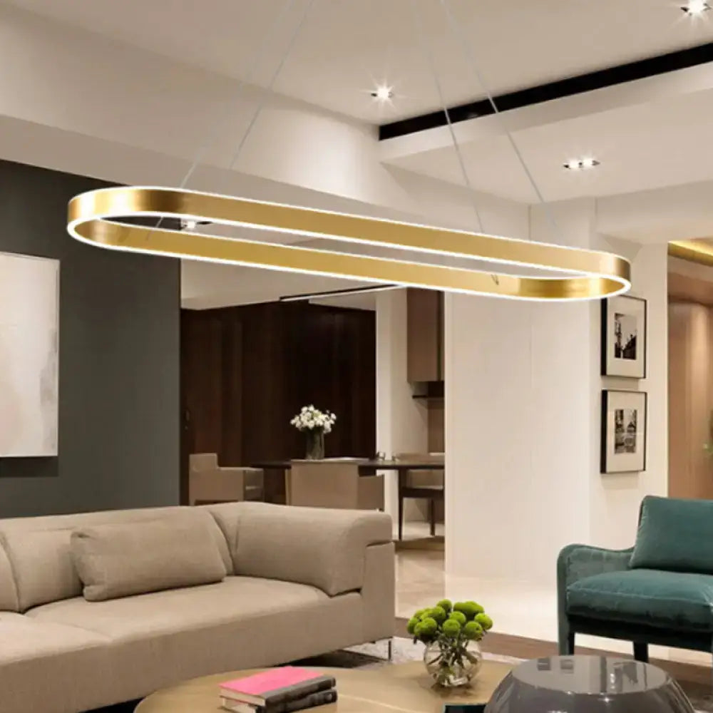 Gold-colored modern oval island pendant ceiling light with sleek metallic finish featuring simplicity ellipse led design