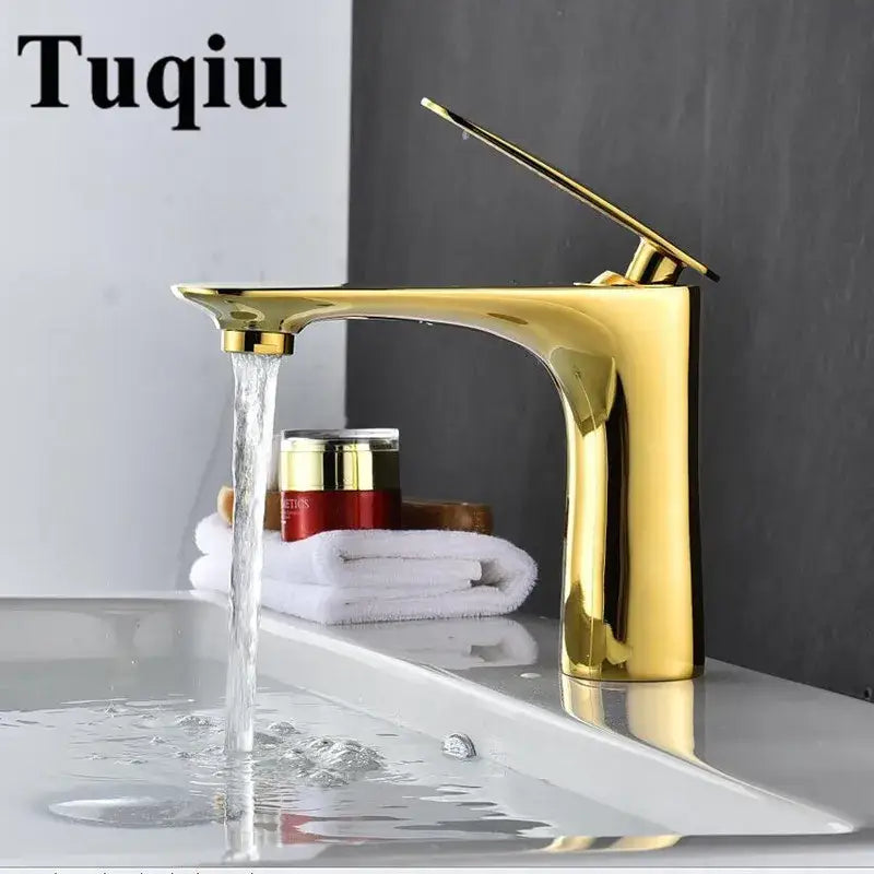 Gold-colored decorbites basin faucet with high-arc spout and minimalist design for modern bathroom sinks