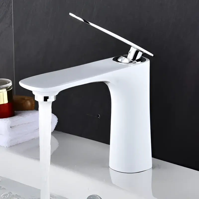 Modern single handle white ceramic basin faucet with sleek minimalist design and polished chrome handle by decorbites basin faucet