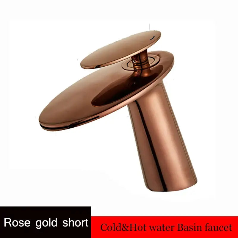 Modern sleek rose gold waterfall basin faucet with two oval spout plates and cylindrical base for bathroom decor