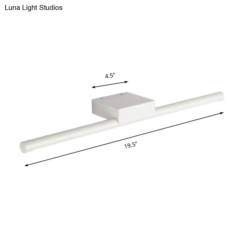 White rectangular wall-mounted light fixture with sleek modern design and warm light for bathroom use 19.5 by 4.5 inches
