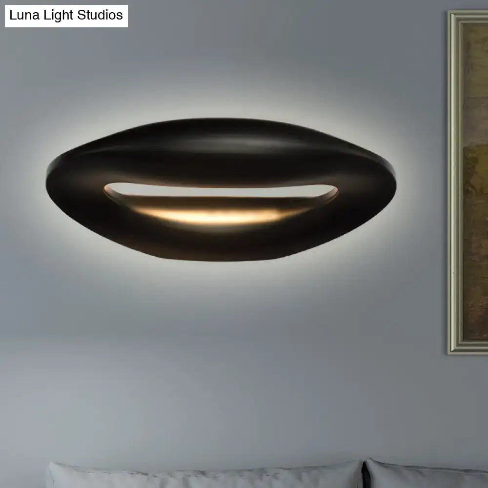 Modern smiling face black and white wall lamp with oval minimalist design and warm ambient led corridor lighting