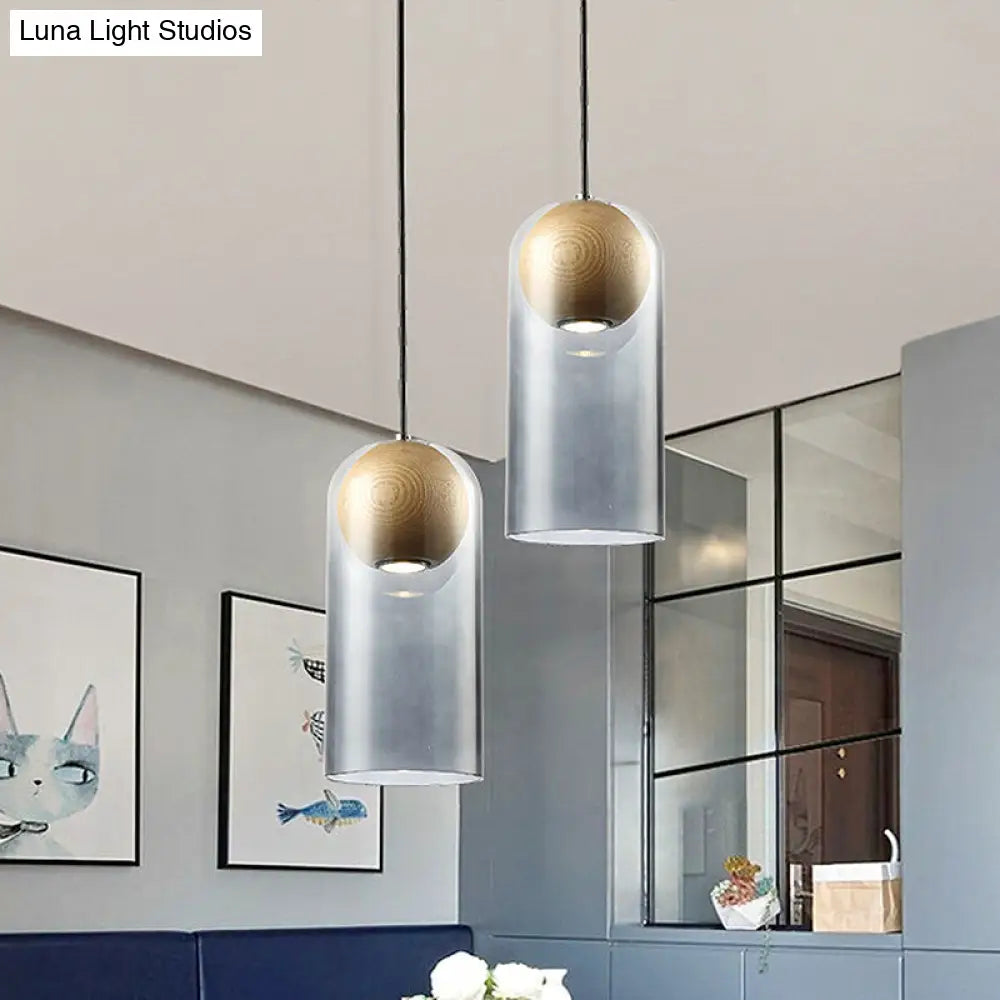 Modern Smoke Gray Glass Cylinder Pendant Light Fixture with Wood Globe Shade - Ideal for Dining Room