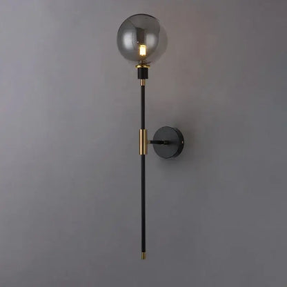 Modern smoked glass ball led wall light with black metal rod and brass accents for elegant bedroom wall light decorbites glass ball