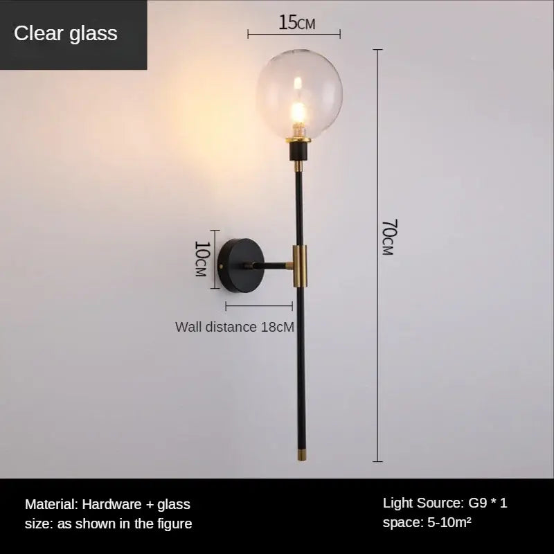 Modern wall light with clear glass globe black and brass accents featuring decorbites glass ball led design for bedroom decor