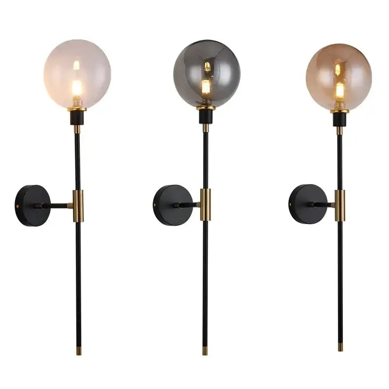 Three modern wall light sconces with decorbites glass ball led bulbs in frosted white smoky gray and amber shades