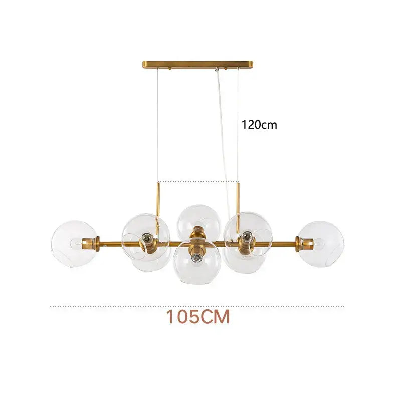 Gold-toned modern decorbites glass ball pendant lights with five clear globes on a sleek horizontal bar for dining room decor