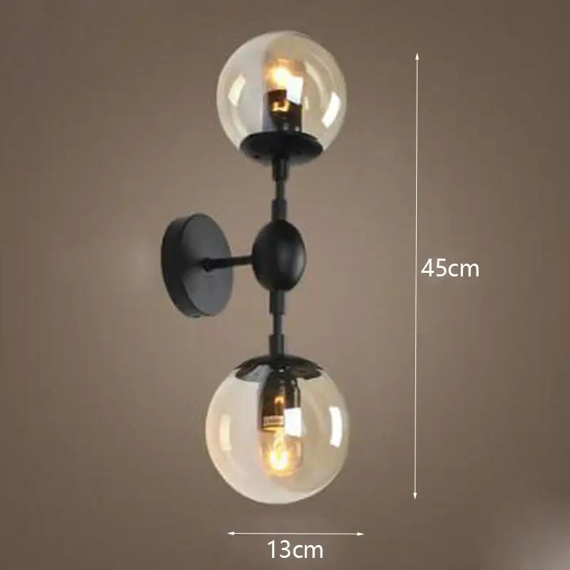 Black metal glass beans wall sconce with two clear smoked glass globe shades modern decorbites beans wall lamp