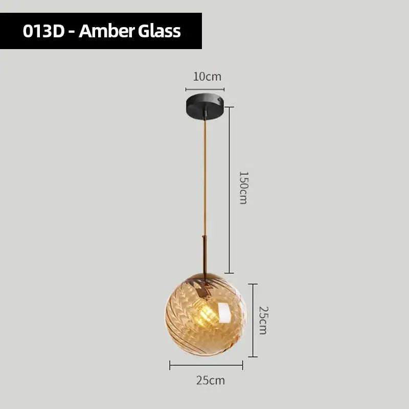 Amber glass pendant lights with textured spherical globes and brass-toned metal hardware for modern kitchen chandelier pendant lights set of 4