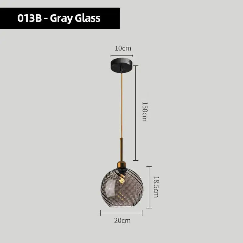 Modern smoked glass chandelier pendant lights set of 4 featuring gray textured spherical shades with brass accents for kitchen