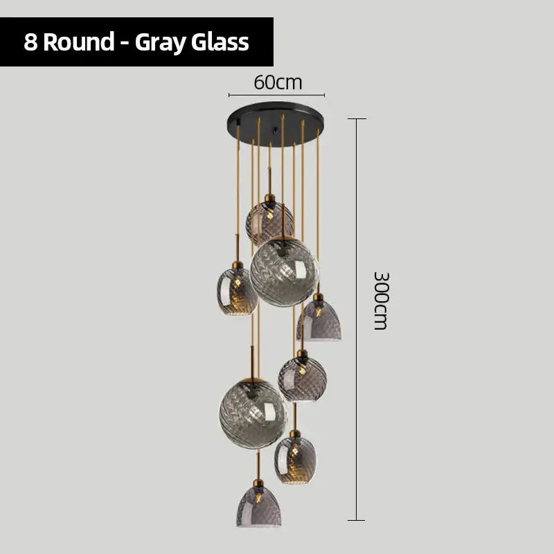 Modern smoked glass chandelier pendant lights set of 4 featuring gray textured glass orbs and gold-toned rods for kitchen use