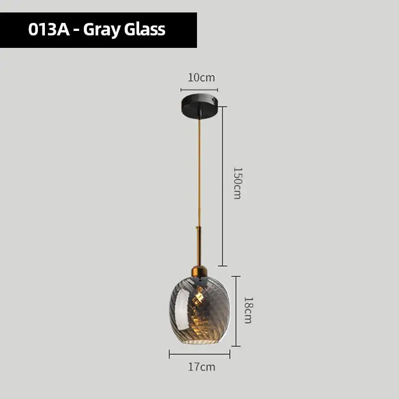 Modern smoked glass chandelier pendant lights set of 4 featuring gray textured spherical shade and brass hardware for kitchen