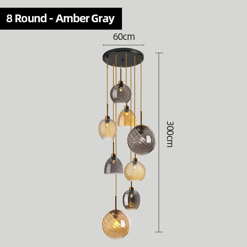 Amber gray round glass chandelier pendant lights with eight textured spherical shades and black ceiling mount for kitchen